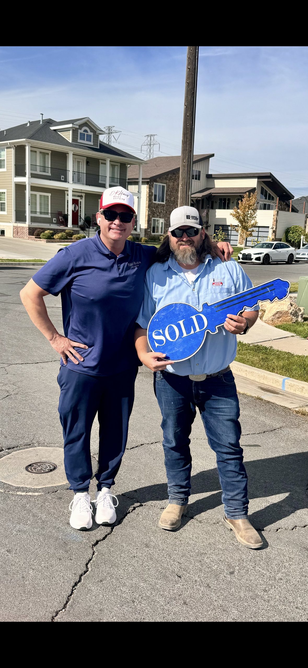 SOLD! Client holding the big blue key 🔑