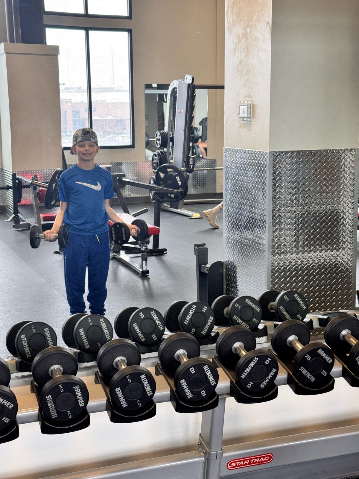 Carter hitting the weights — a true mini-me 💪